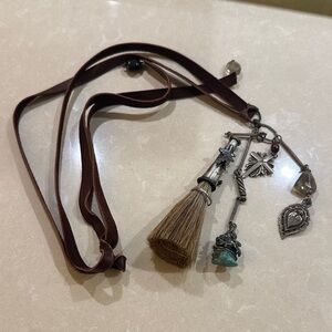 Leather necklace with charms and kilt pin
